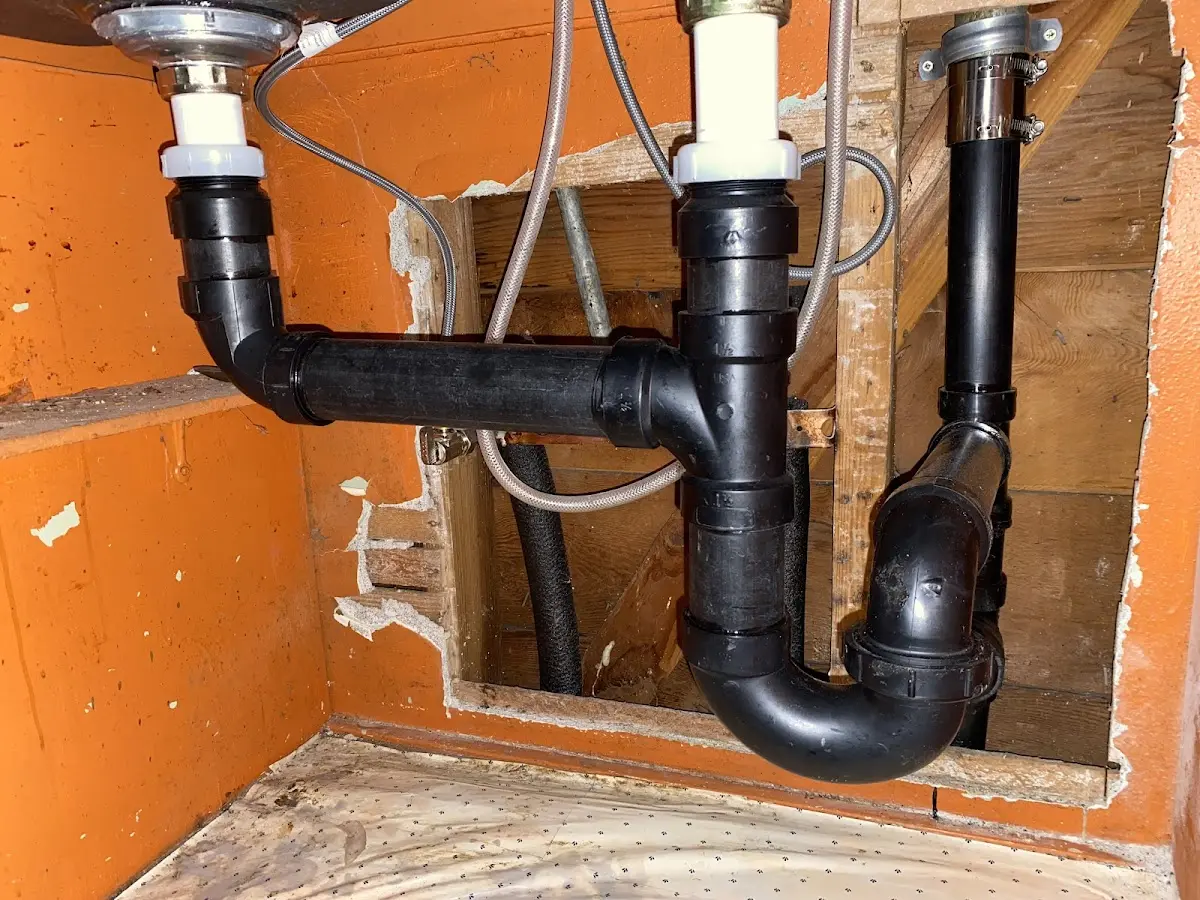 Professional Garbage Disposal Repair equipment and tools on the job in Carolina Beach